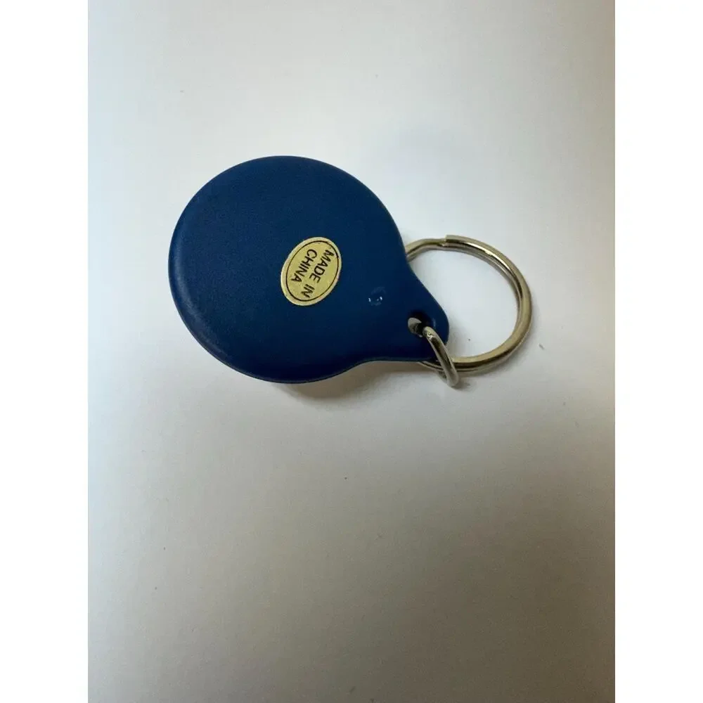 Vintage CompUSA computer keychain